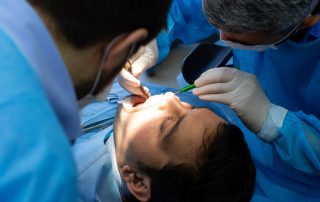 Patient going through dental surgery