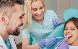 child laughing at dental appointment