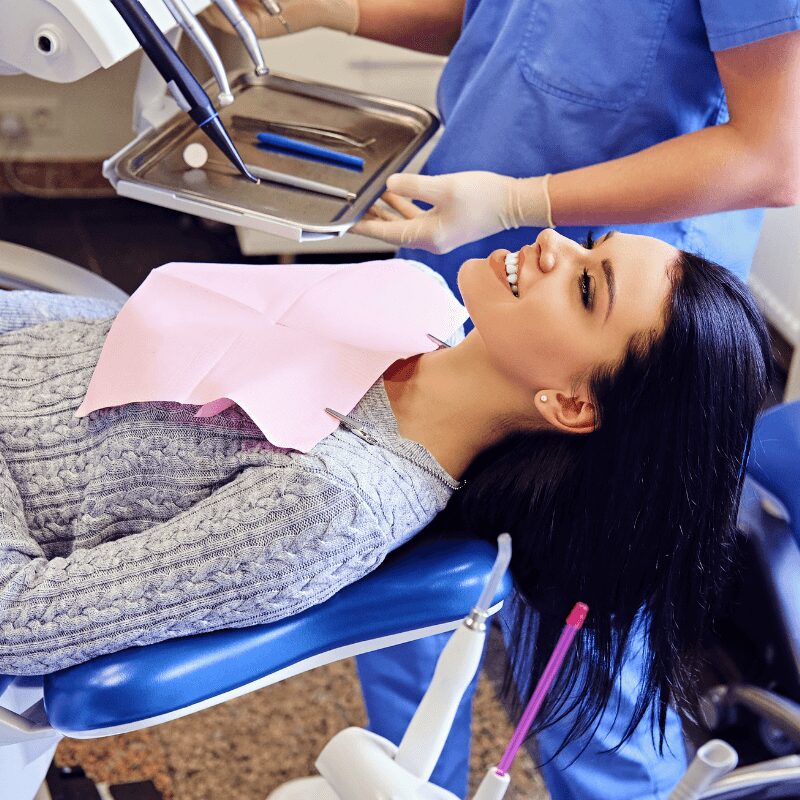 close-up-image-dentist-examining-female oral health