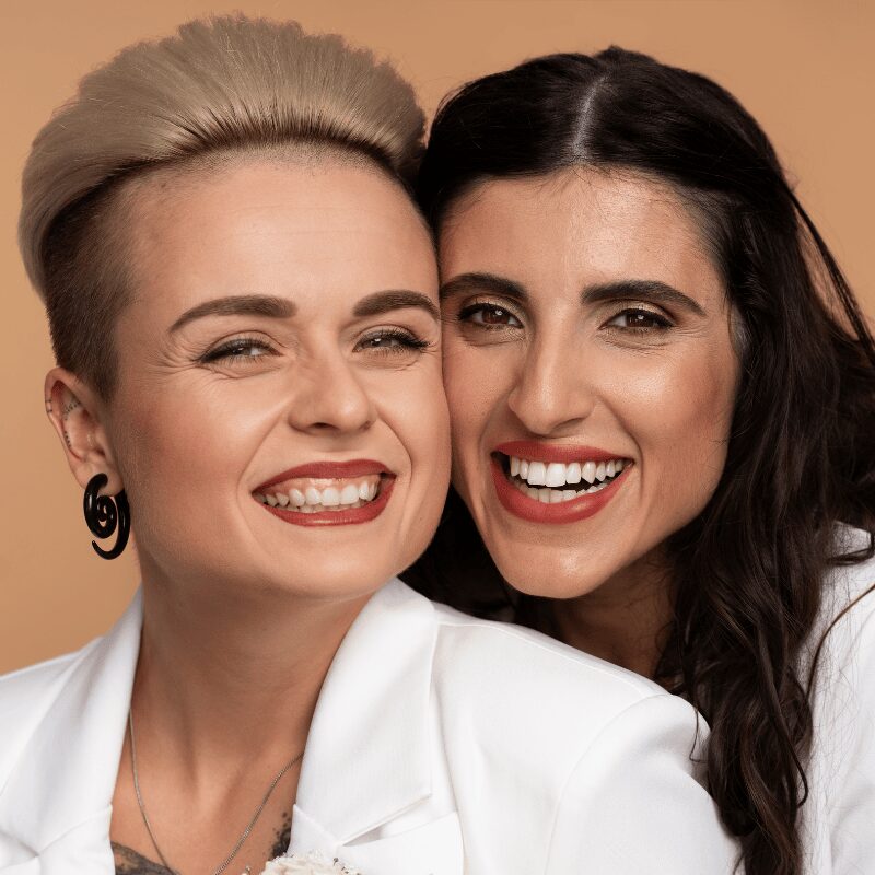 two girls with porcelain and composite veneers smiling